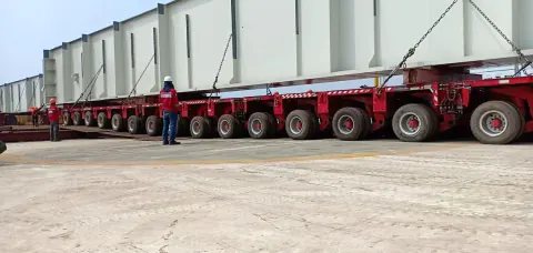 PAL oversized cargo movement on a long modular trailer